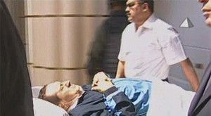 Mubarak on a stretcher
